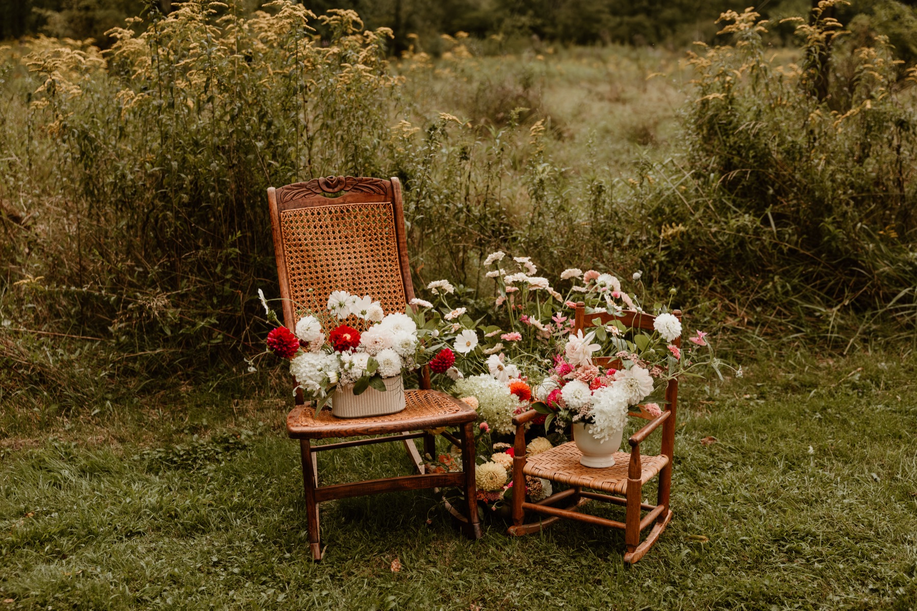 Seasonal flower arrangements set among the grasses in a meadow